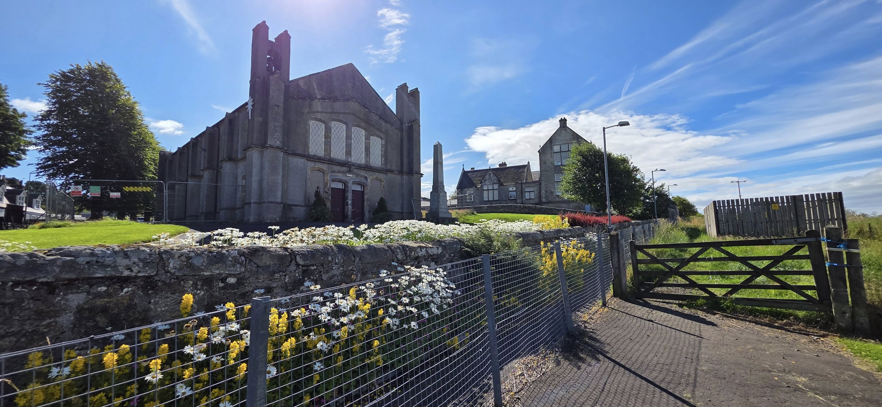 View of church, cenotaph and school