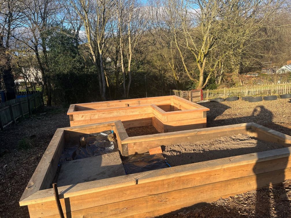 Installation of large accessible raised beds with wood purchased from Scottish Wood